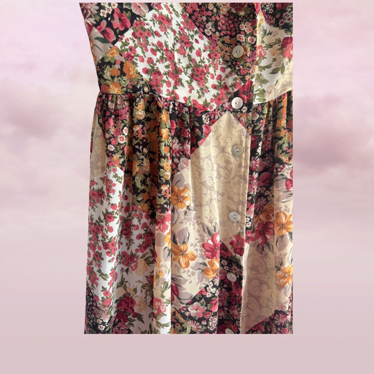 Floral patterned dress with a pink background