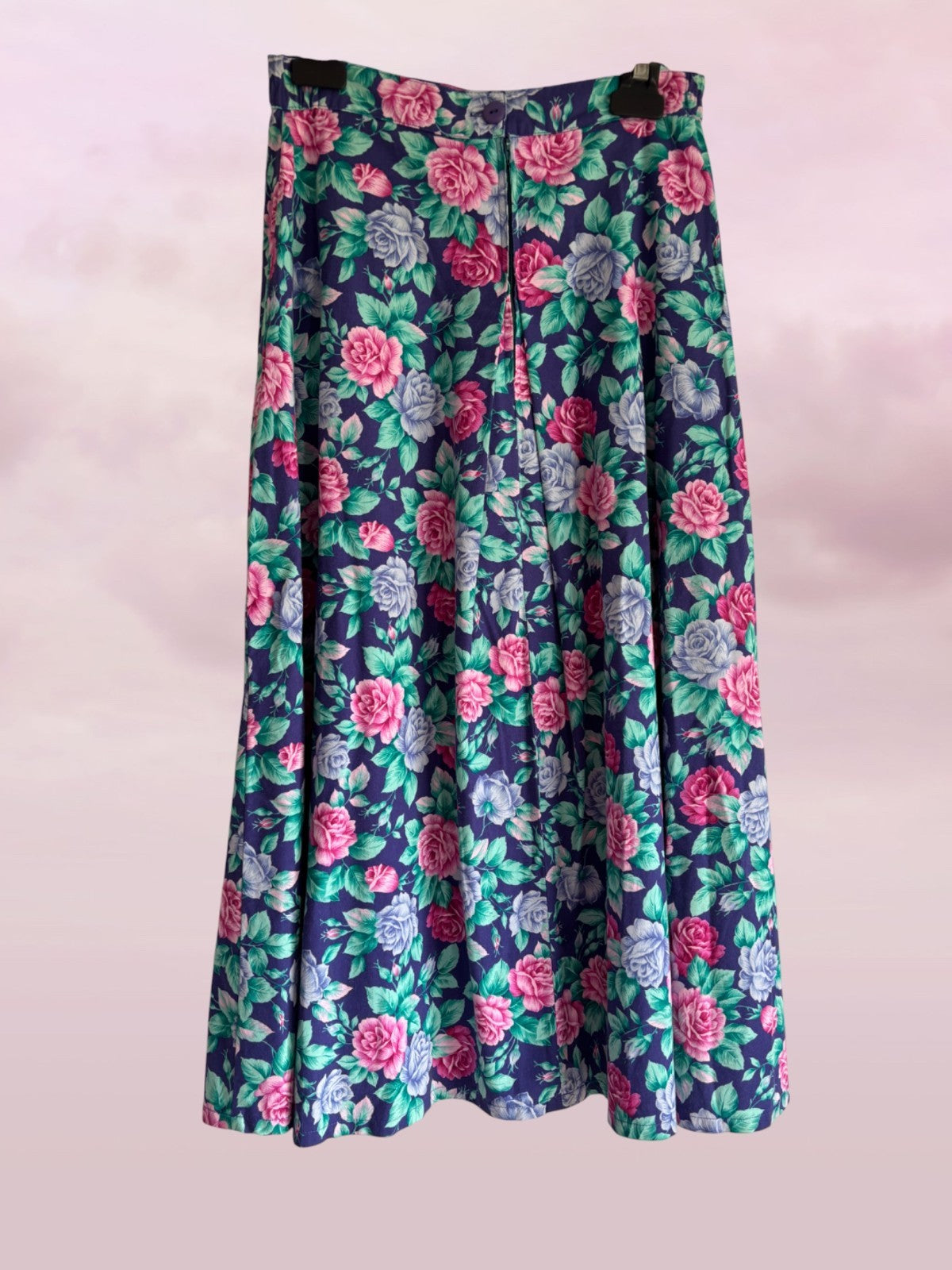 Floral patterned skirt on a light pink background