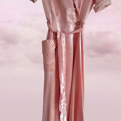Pink satin robe on a pink background