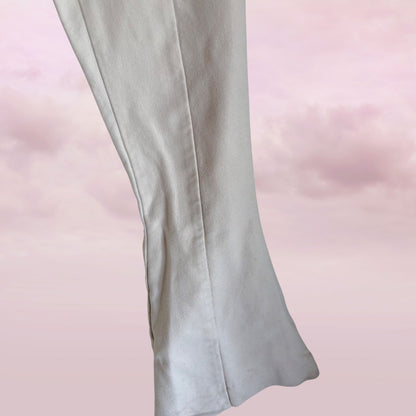white pants on a pink background