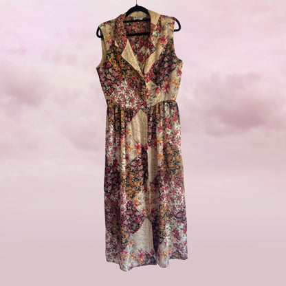 Floral dress on a hanger against a pink background