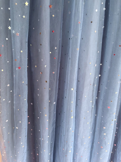 Sheer blue dress with star patterns