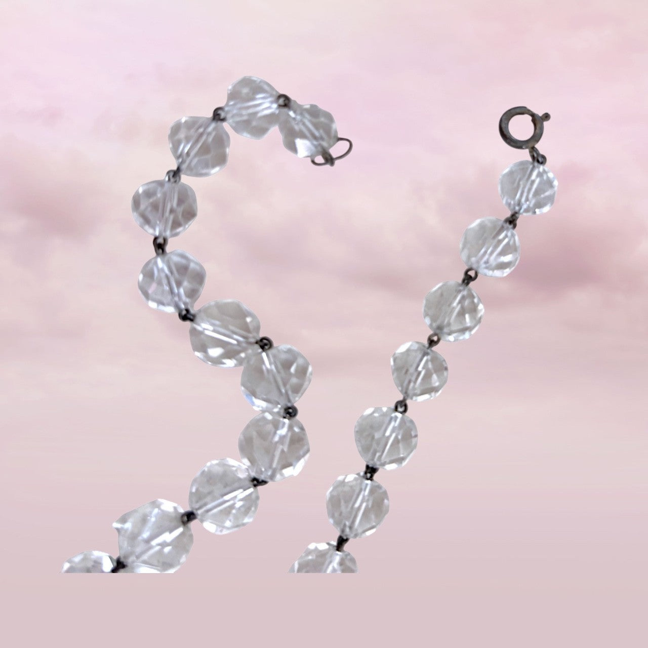 Spring clasp and wire connection on vintage faceted crystal beaded necklace 1950s